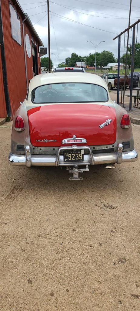 under-car inspection on the lift on the lift at JR Discount Muffler in Palestine, Texas